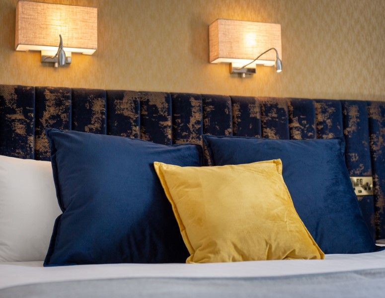 Carriage House Cusions and headboard. (Custom)